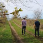 Two men walking on the Kidd CEA